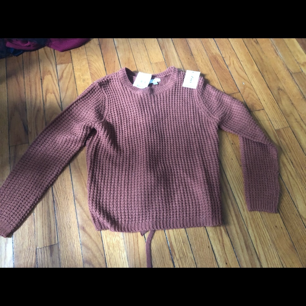 super cute yellowy orange sweater